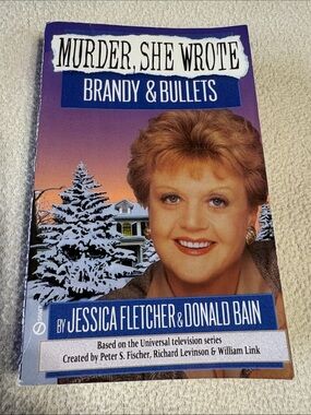 Universal Murder, She Wrote Paperback - Purple Cover